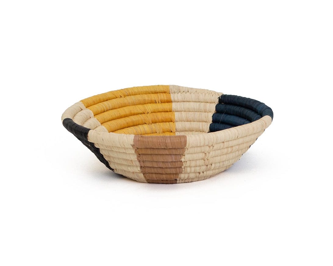Decorative bowl with a striped pattern on a white background
