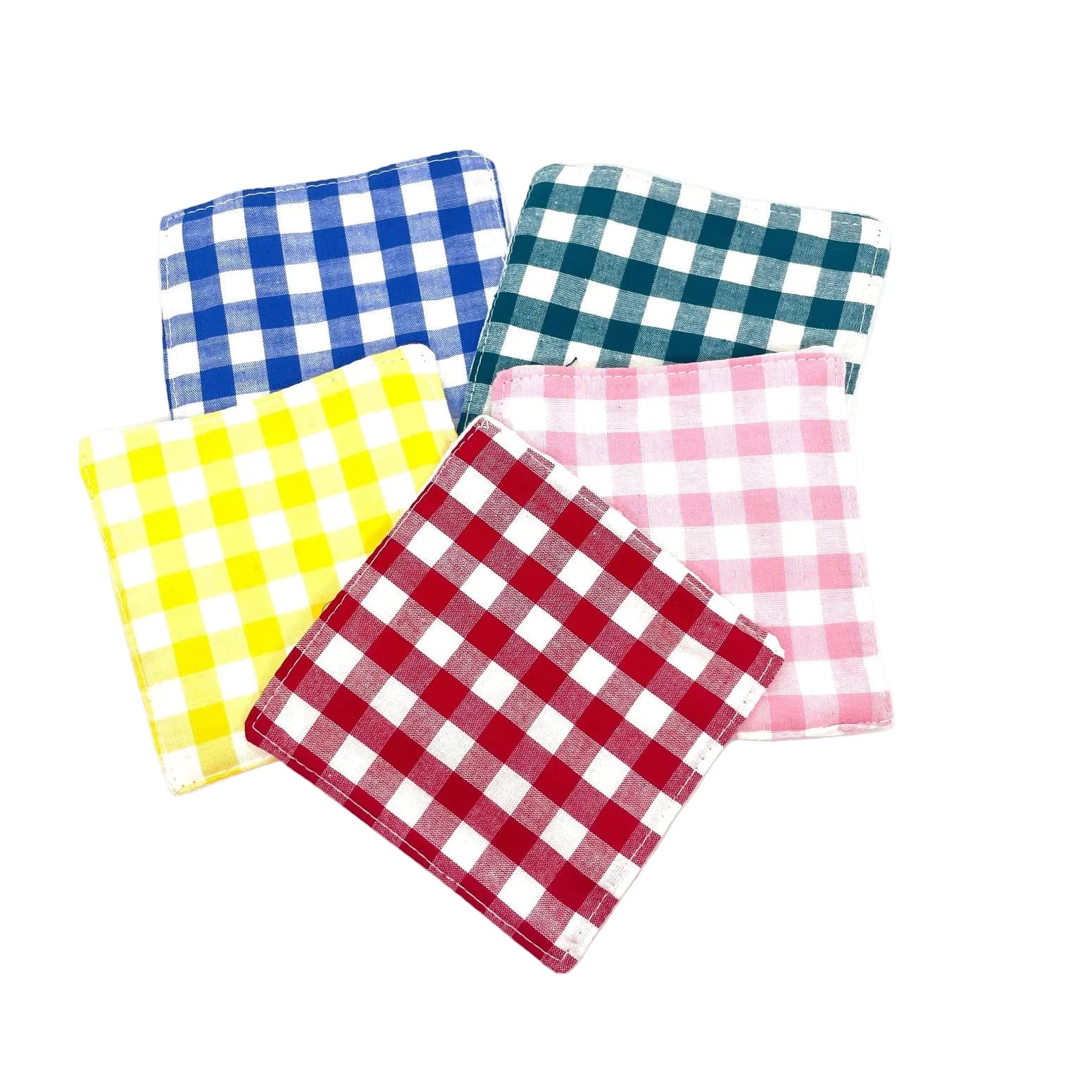 Set of five colorful checkered napkins on a white background