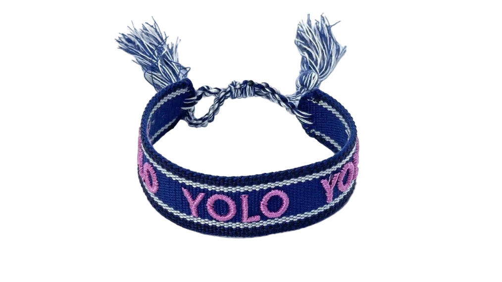 Navy blue bracelet with pink 'YOLO' text on a white background
