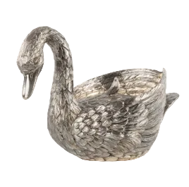 Decorative silver swan-shaped bowl on a white background