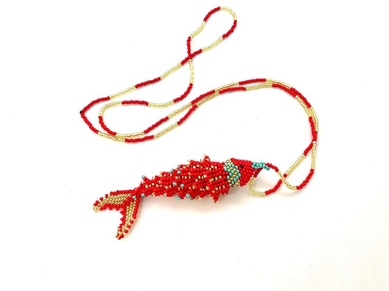 Necklace in beads with fish pendant