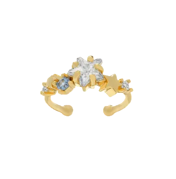 Gold ear cuff with star-shaped gemstones on a white background