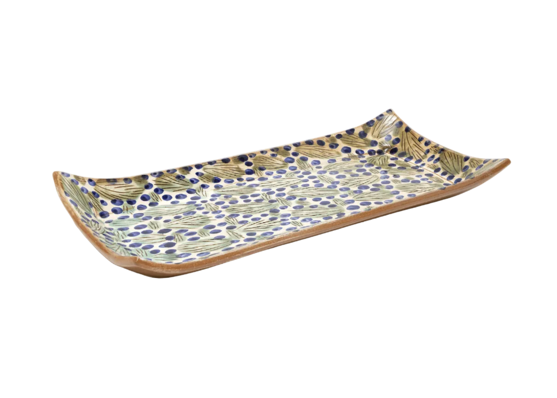 Ceramic tray with decorative pattern on a white background