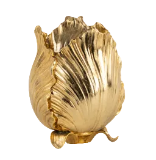 Gold shell-shaped decorative item on a white background