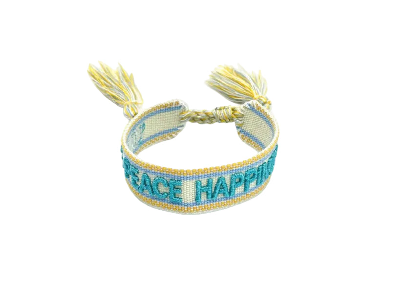 Bracelet with 'Peace Happiness' text and tassels on a white background