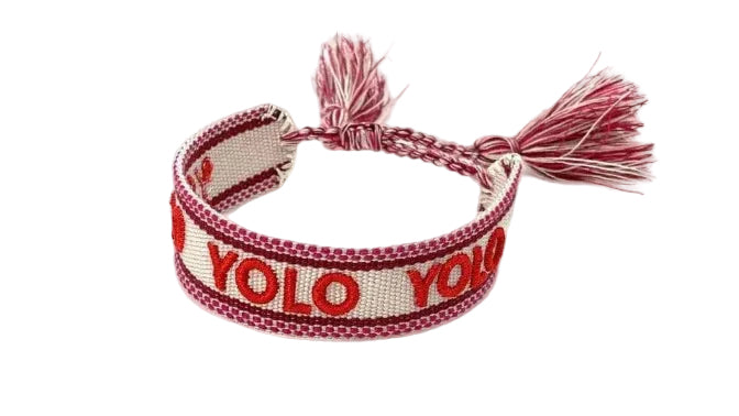 Bracelet with 'YOLO' text on a white background